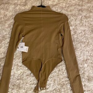 Good American scuba funnel neck bodysuit
